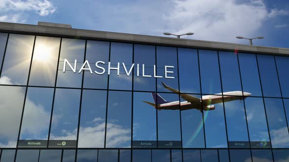 VideoHive Airplane landing at Nashville Tennessee, USA airport mirrored in terminal 34238492