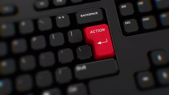 VideoHive Action button on keyboard. A finger presses Enter. Click Action. Realistic keyboard button. Close Up 38994390