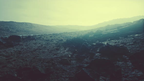 VideoHive Snow Covered Rocky Hill in Middle of Desert on Cloudy Day 39011297