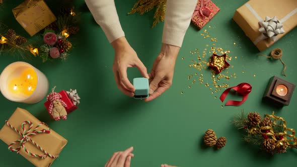 VideoHive Groom Proposing with Beautiful Wedding Ring Bride Trying Diamond Ring Christmas 48592814